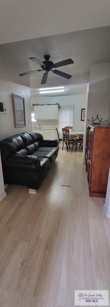 unfurnished bedroom featuring ceiling fan and hardwood / wood-style floors