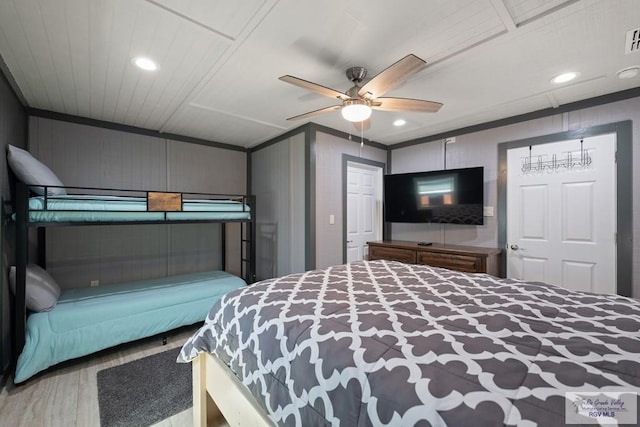 bedroom featuring ceiling fan and ornamental molding