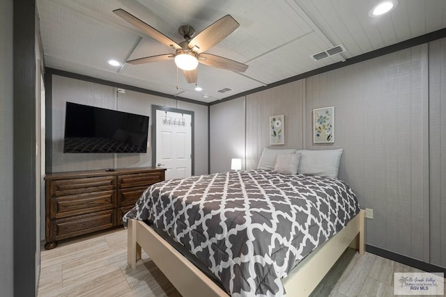 bedroom featuring ceiling fan and light wood-type flooring