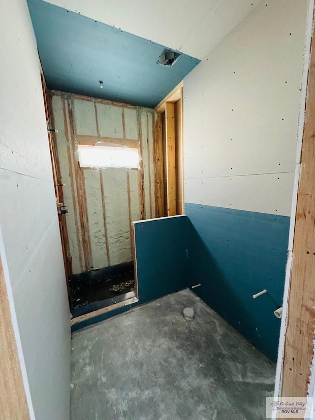 825 Milania Dr, La Feria, TX 78589 - bathroom featuring unfinished concrete floors