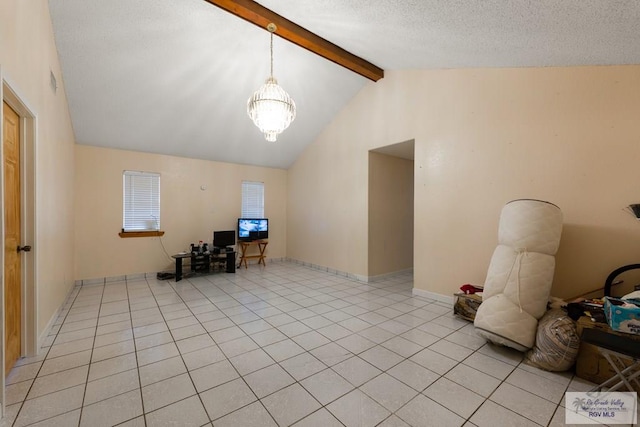 unfurnished office with a textured ceiling, lofted ceiling with beams, and light tile patterned flooring