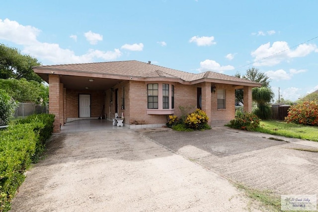 view of front of house with a carport