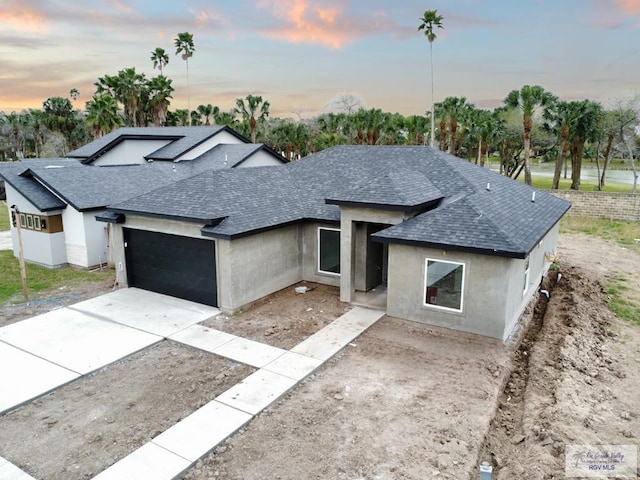 view of front of home featuring a garage