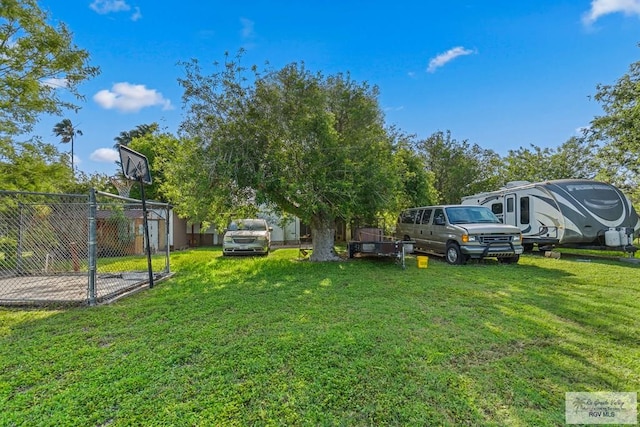 view of yard with fence