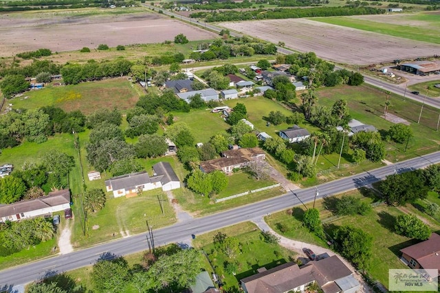 aerial view with a rural view and a residential view