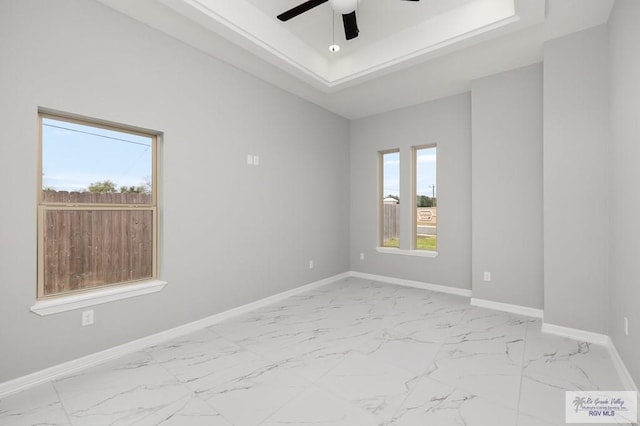 802 Olivia Dr, Mercedes, TX 78570 - spare room with ceiling fan and a raised ceiling