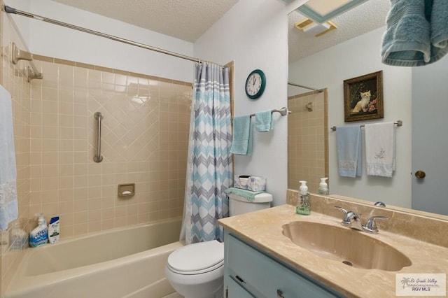 full bathroom with vanity, toilet, a textured ceiling, and shower / bath combo