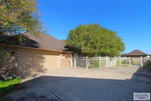 exterior space with a garage