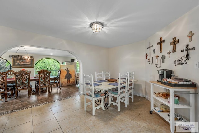 dining space with light wood-type flooring