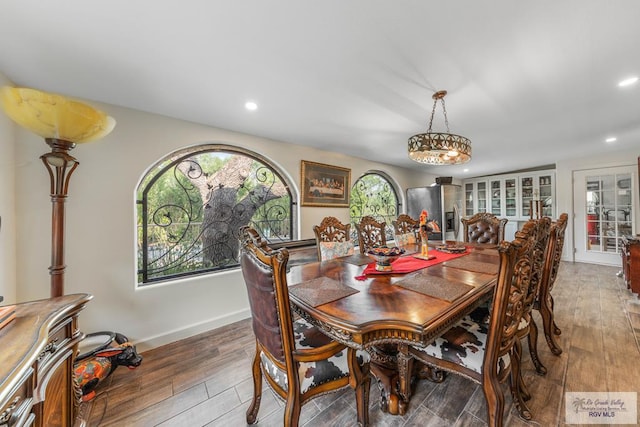 dining space featuring hardwood / wood-style floors