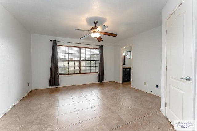 interior space featuring ceiling fan and light tile patterned flooring