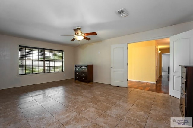 unfurnished room with ceiling fan