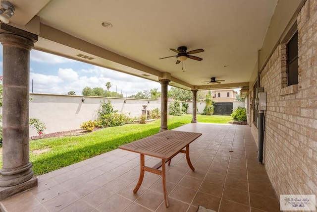 view of patio / terrace featuring ceiling fan