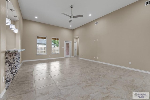 2402 S Christian Cir, Harlingen, TX 78550 - unfurnished living room featuring a ceiling fan and recessed lighting