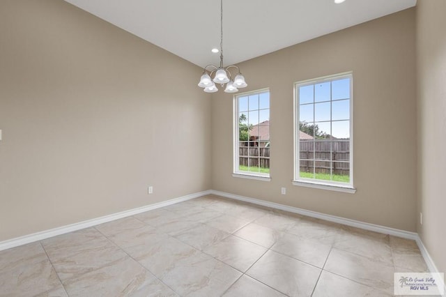 2402 S Christian Cir, Harlingen, TX 78550 - spare room featuring a chandelier and recessed lighting