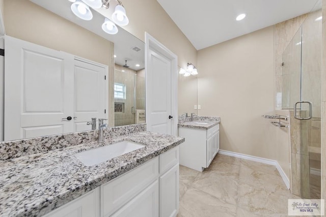 2402 S Christian Cir, Harlingen, TX 78550 - full bath with a stall shower, two vanities, and marble finish floors