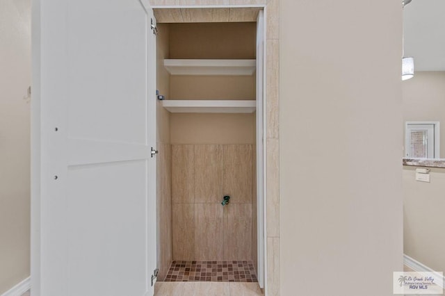 2402 S Christian Cir, Harlingen, TX 78550 - bathroom featuring a tile shower