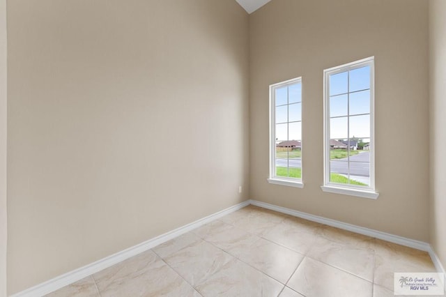 2402 S Christian Cir, Harlingen, TX 78550 - unfurnished room with baseboards and light tile patterned floors