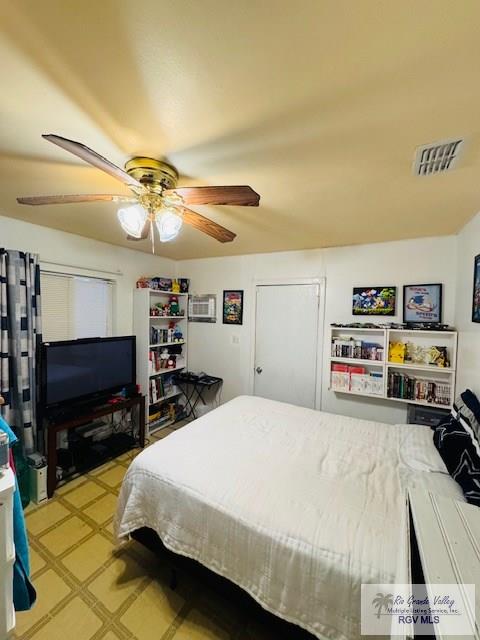 217 E Mckinley Ave, Harlingen, TX 78550 - bedroom featuring ceiling fan