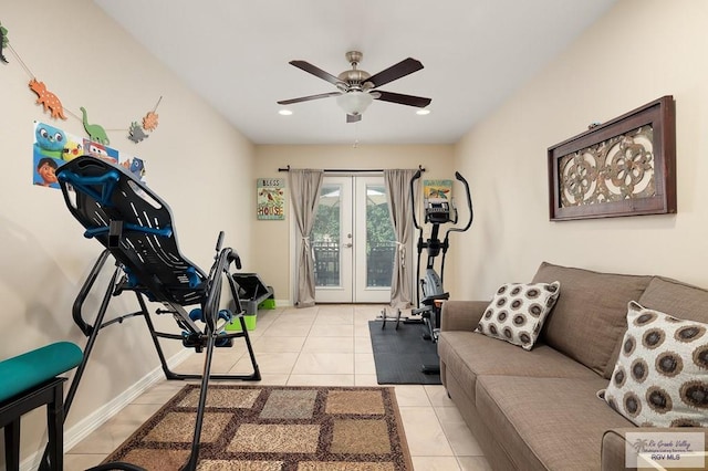 workout room with ceiling fan, light tile patterned flooring, and french doors