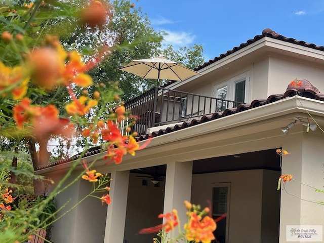 view of home's exterior featuring a balcony