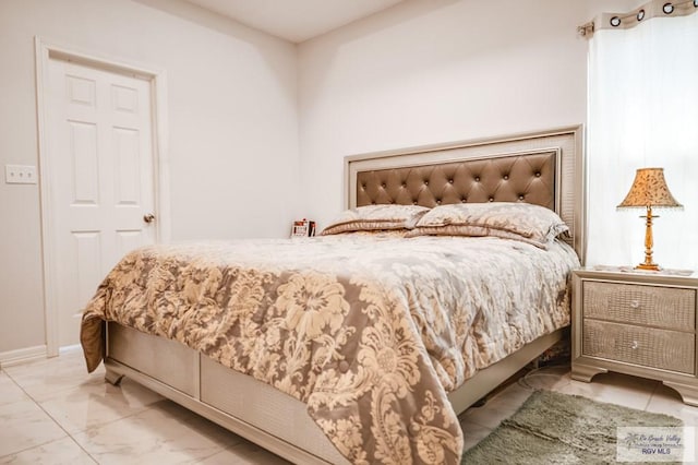 2318 W Arbor St, Harlingen, TX 78552 - bedroom with marble finish floors and baseboards