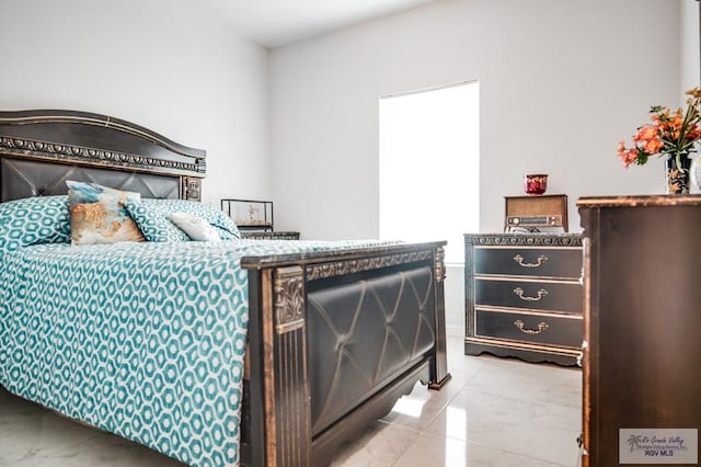 2318 W Arbor St, Harlingen, TX 78552 - bedroom with marble look tiles