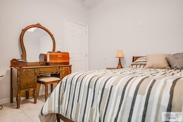 2318 W Arbor St, Harlingen, TX 78552 - bedroom featuring marble finish flooring and baseboards