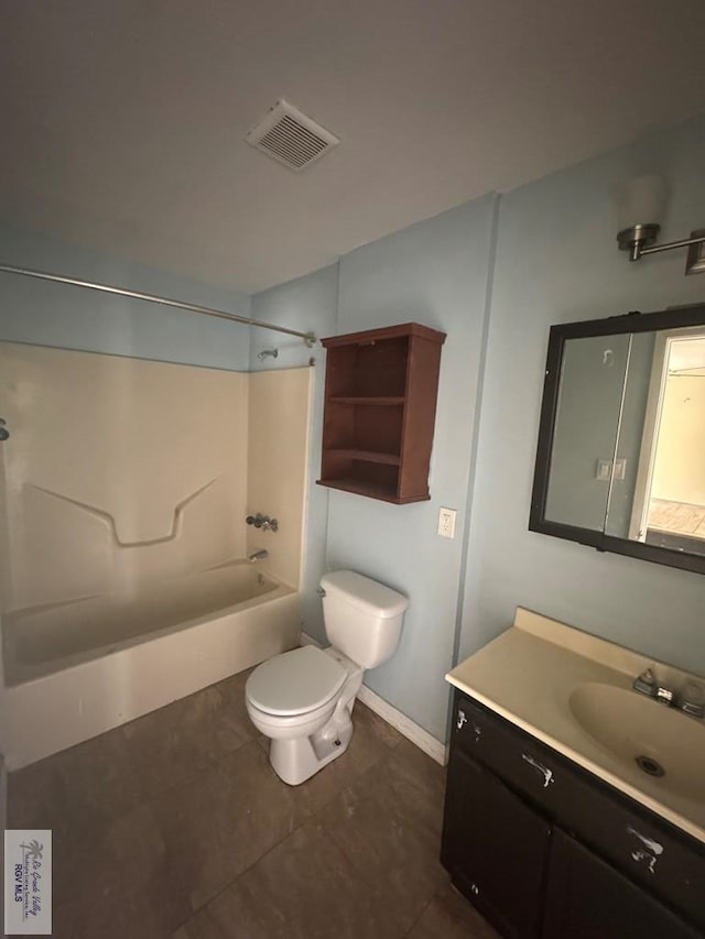 44 Highland Ter, Brownsville, TX 78521 - full bathroom featuring vanity, shower / bath combination, toilet, tile patterned floors, and baseboards