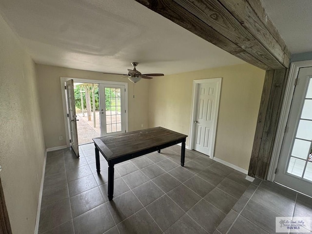 44 Highland Ter, Brownsville, TX 78521 - playroom featuring healthy amount of natural light, ceiling fan, and dark tile patterned flooring