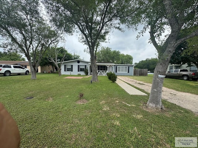 44 Highland Ter, Brownsville, TX 78521 - ranch-style home featuring a front yard