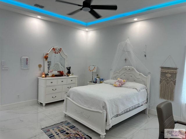 bedroom with a ceiling fan, marble finish floor, visible vents, and baseboards