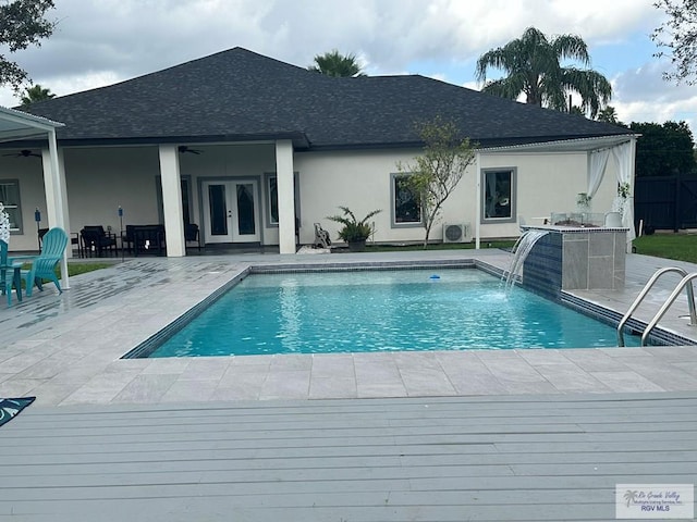 view of swimming pool featuring a fenced in pool, french doors, ceiling fan, and a patio