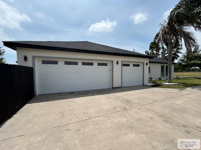 exterior space with concrete driveway