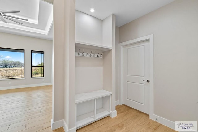 mudroom with ceiling fan and light wood-type flooring