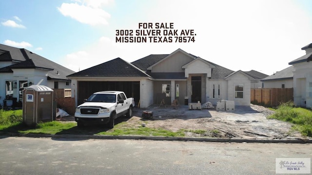 view of front of home with a garage