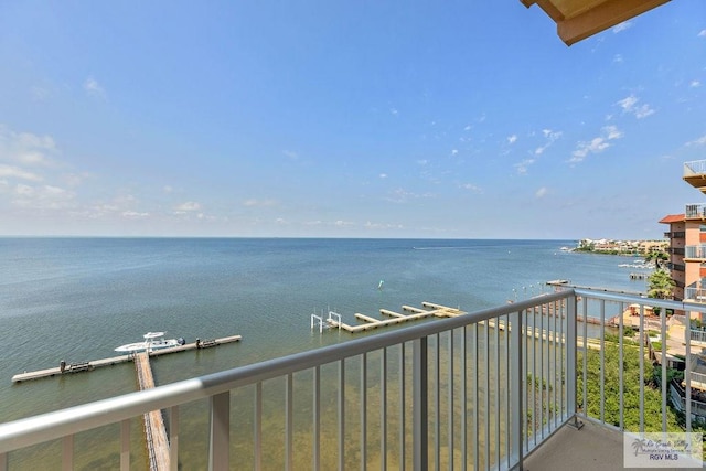 balcony featuring a water view