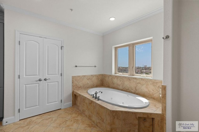 bathroom with crown molding and tiled tub