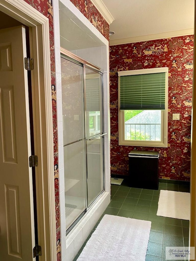 bathroom with tile patterned flooring and an enclosed shower