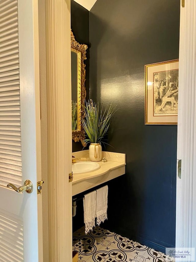 bathroom with tile patterned flooring