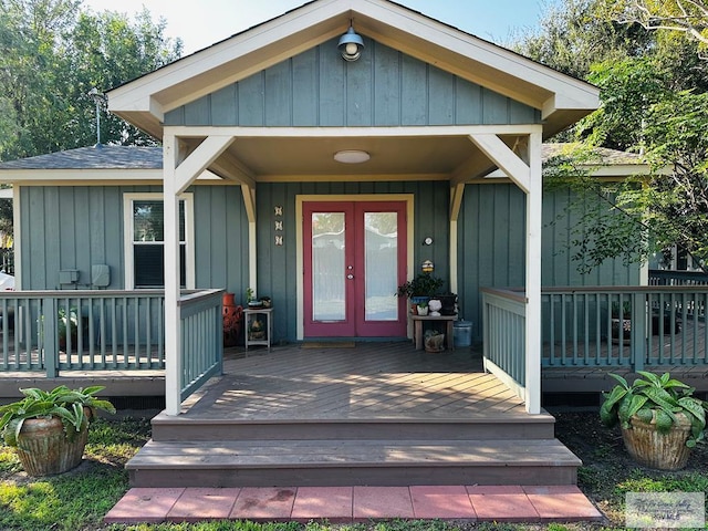 view of exterior entry featuring french doors