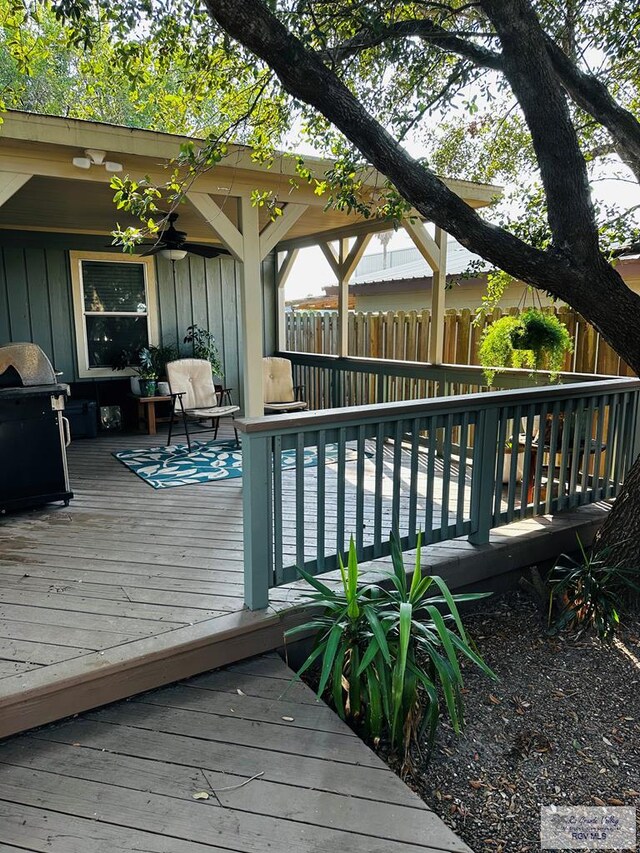 deck featuring a grill