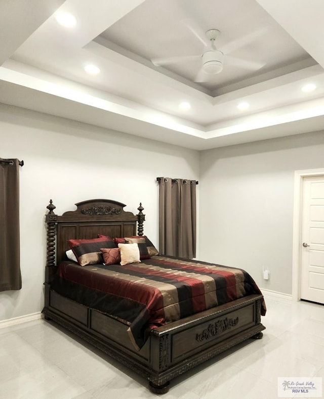 bedroom with recessed lighting, baseboards, a raised ceiling, and ceiling fan