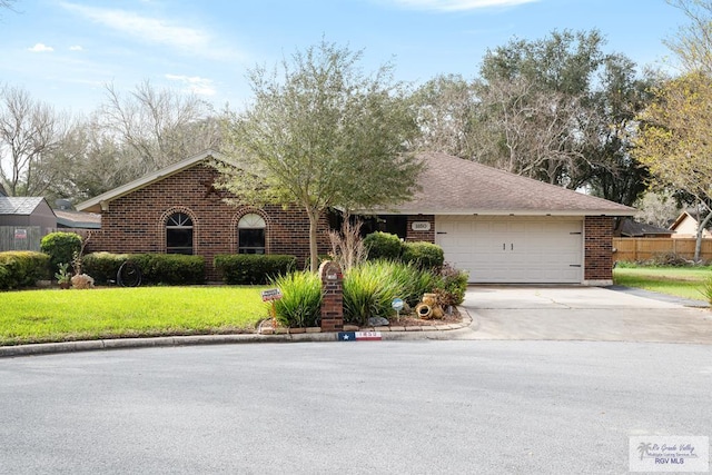 single story home featuring concrete driveway, brick siding, a front lawn, and an attached garage