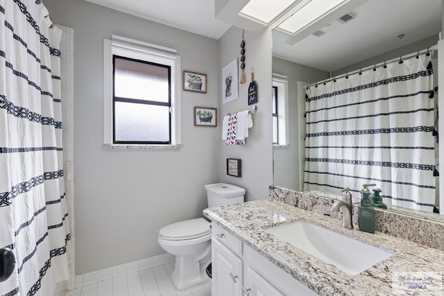 full bath featuring visible vents, toilet, vanity, baseboards, and tile patterned floors