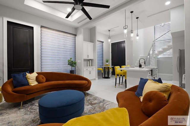 living room featuring ceiling fan