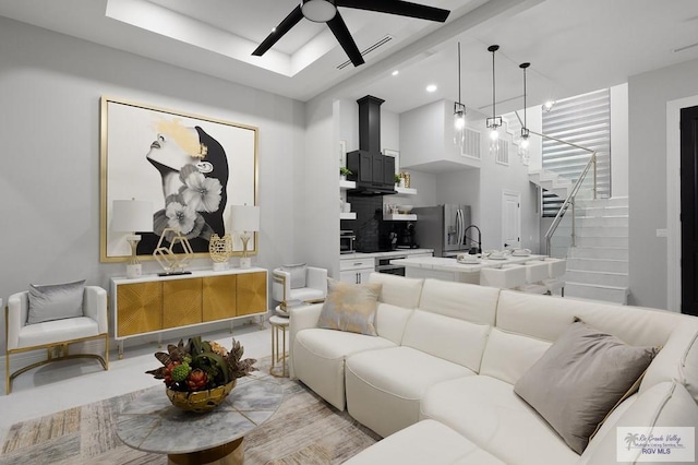 living room with ceiling fan