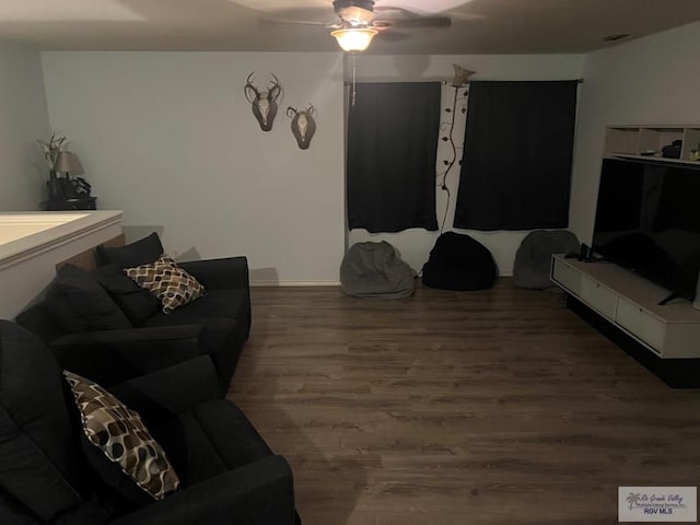 17211 Tangelo Ave, Harlingen, TX 78552 - living area featuring wood finished floors and a ceiling fan