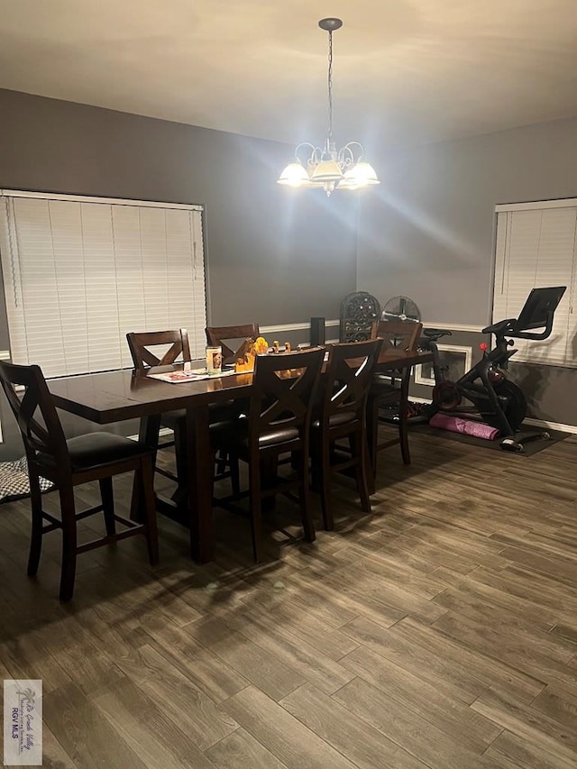 17211 Tangelo Ave, Harlingen, TX 78552 - dining area with wood finished floors and a chandelier