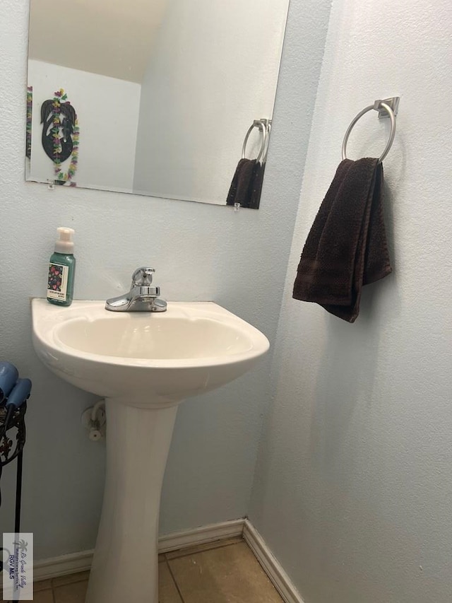 17211 Tangelo Ave, Harlingen, TX 78552 - bathroom with tile patterned flooring and a sink